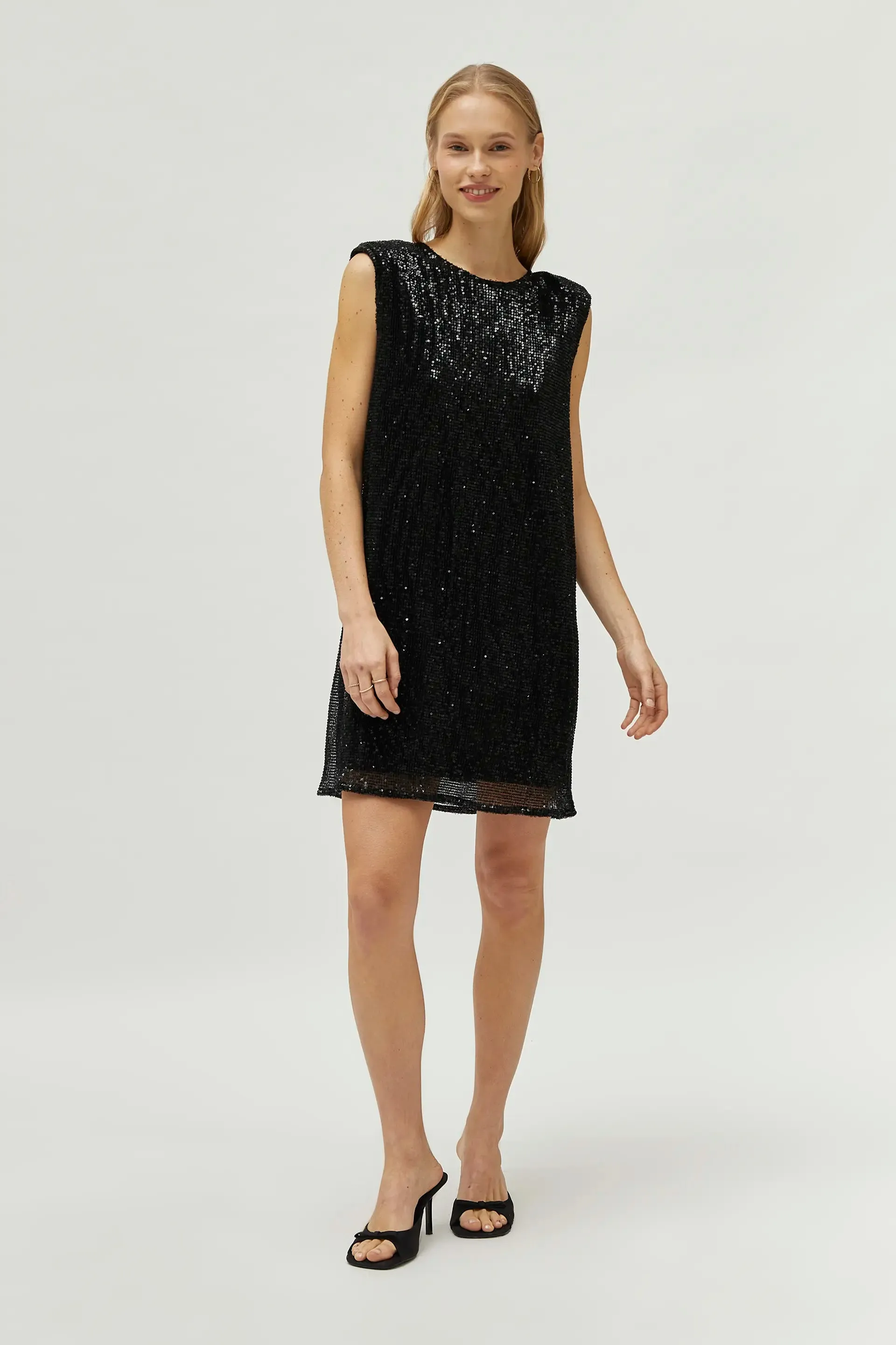 Abito corto nero in paillettes
