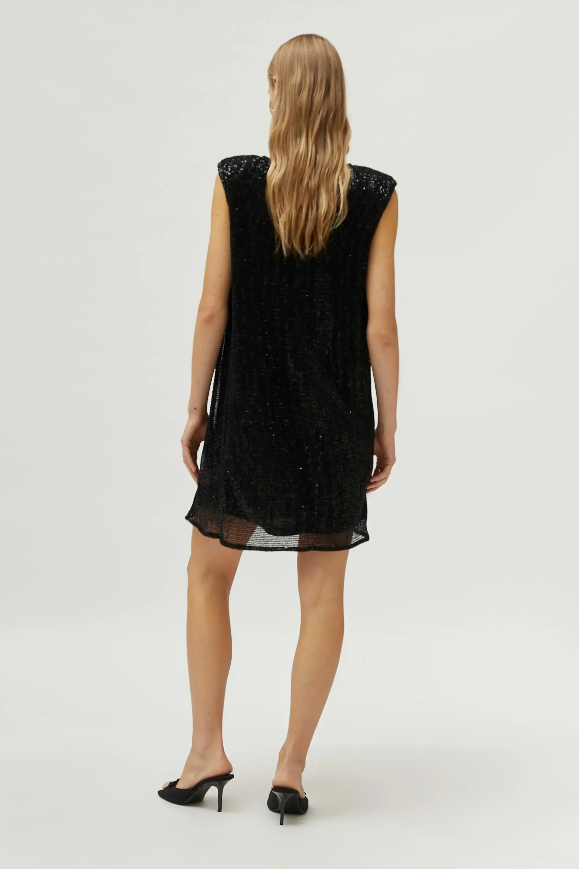 Abito corto nero in paillettes