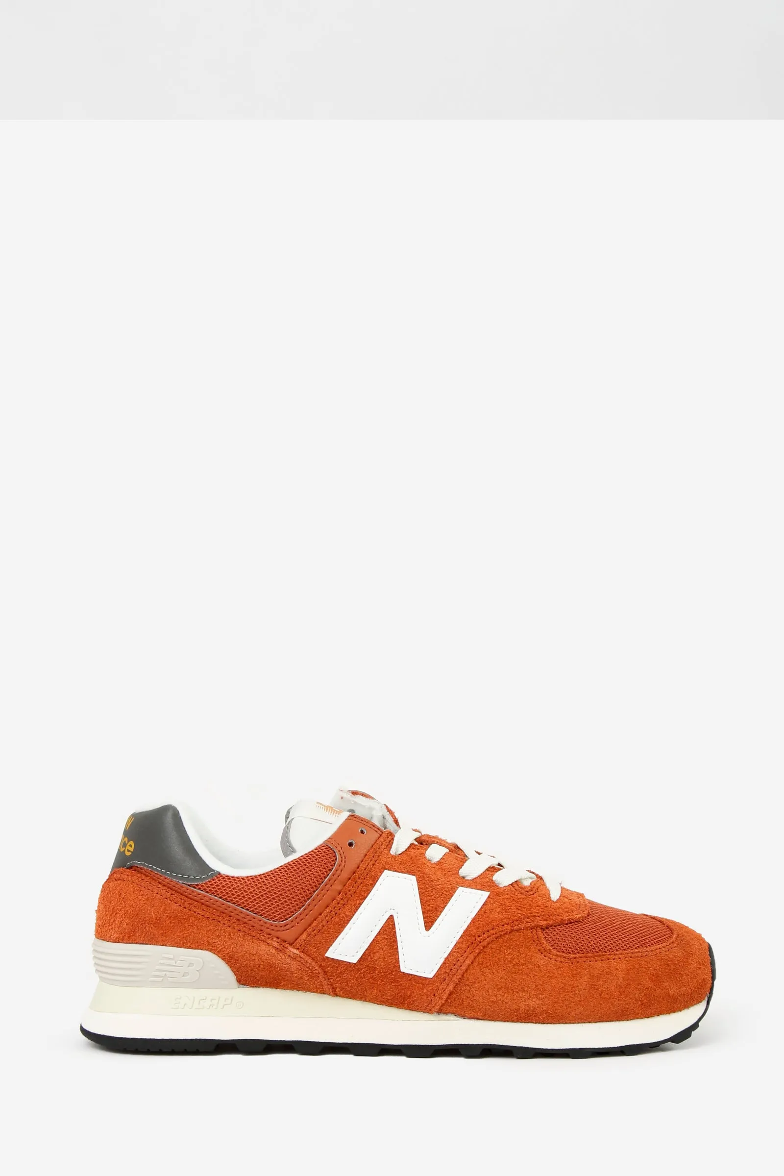 Sneakers 574 in camoscio e tessuto rosso
