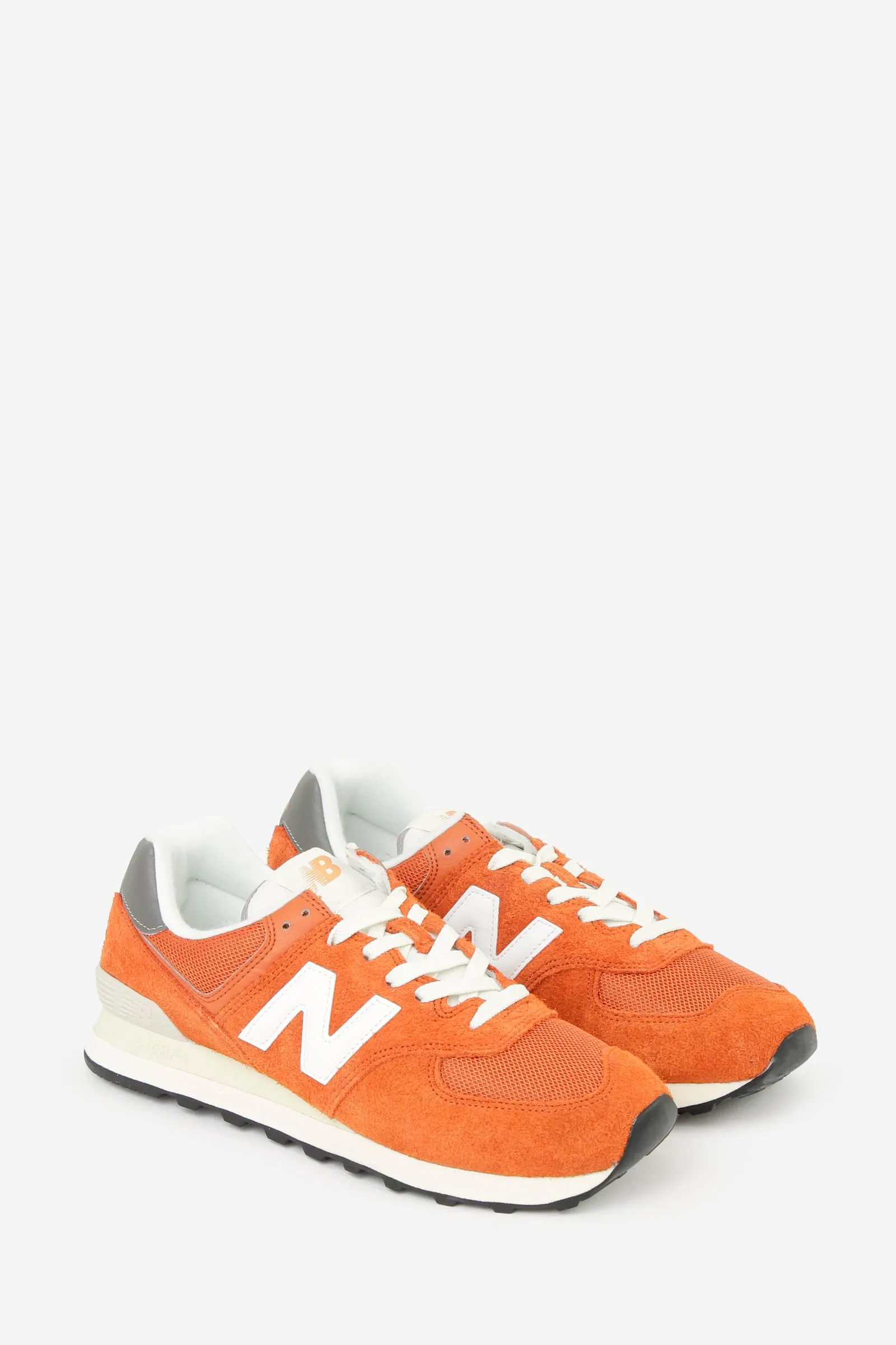 Sneakers 574 in camoscio e tessuto rosso